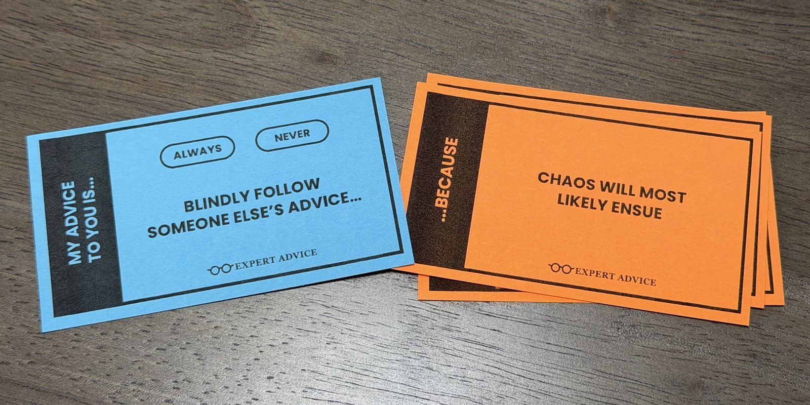 A blue ADVICE card reading &lsquo;Blindly follow someone else&rsquo;s advice&hellip;&rsquo; next to an orange BECAUSE card reading &lsquo;&hellip;because chaos will most likely ensue&rsquo;